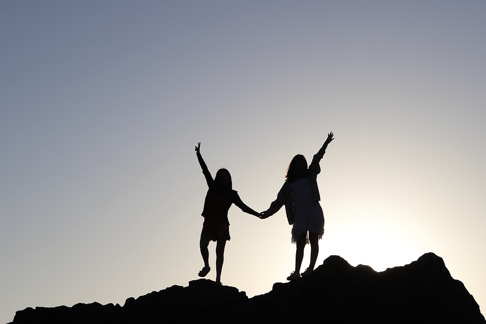 two girl shadow pose