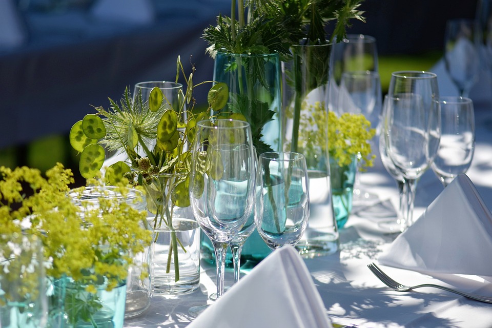 table with full of wine glasses photo