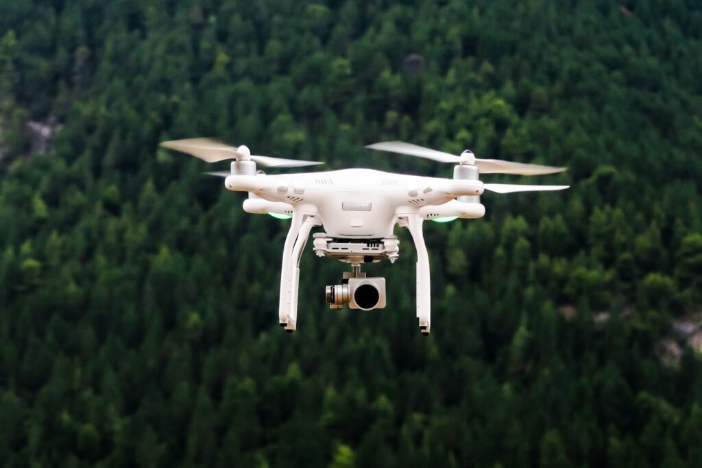 Drone flying in the sky, illustrating the expanding use of drones in warfare
