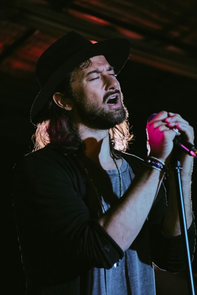 Musician performing with a microphone in Hollywood, Los Angeles