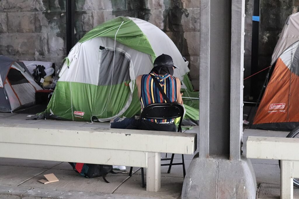 Tents and belongings at a homeless encampment beneath an overpass in Washington, D.C.