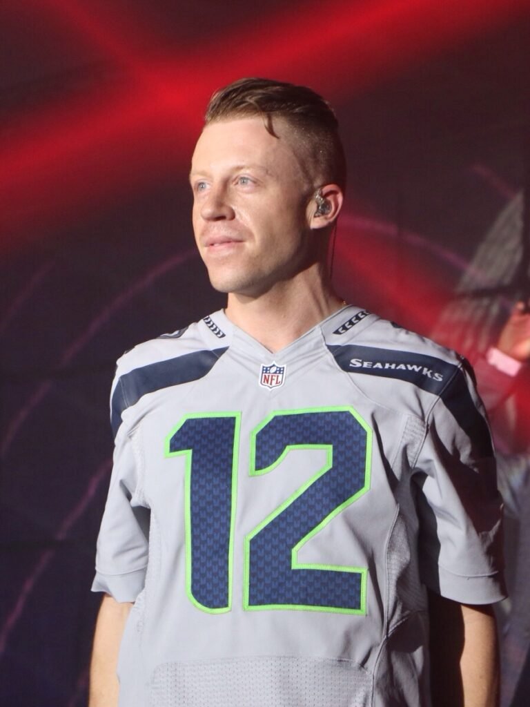 Macklemore performing at a Super Bowl event