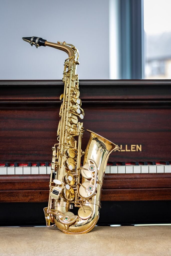 Close-up of a brass saxophone on a dark background