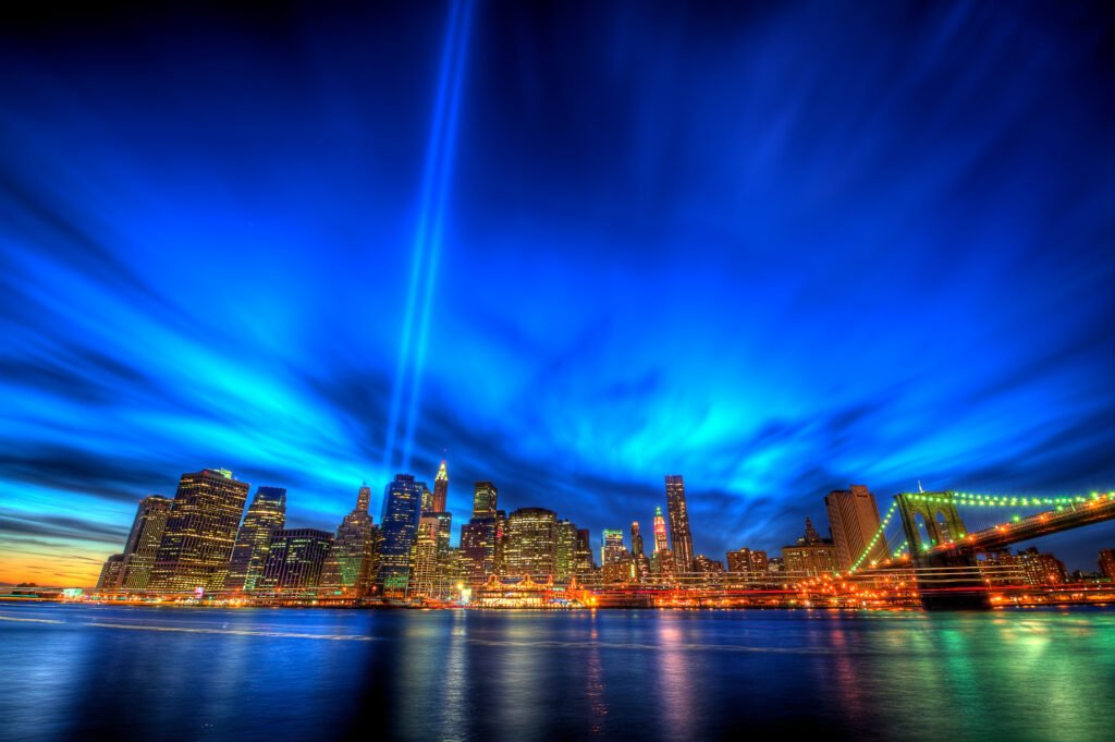 Tribute in Light memorial with Manhattan skyline at dusk