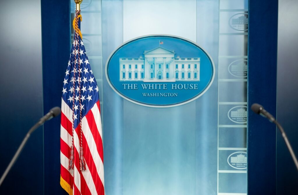 Empty White House press briefing room with podium and press seating