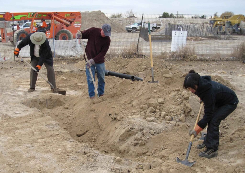 Construction workers with their tools in an archival photograph