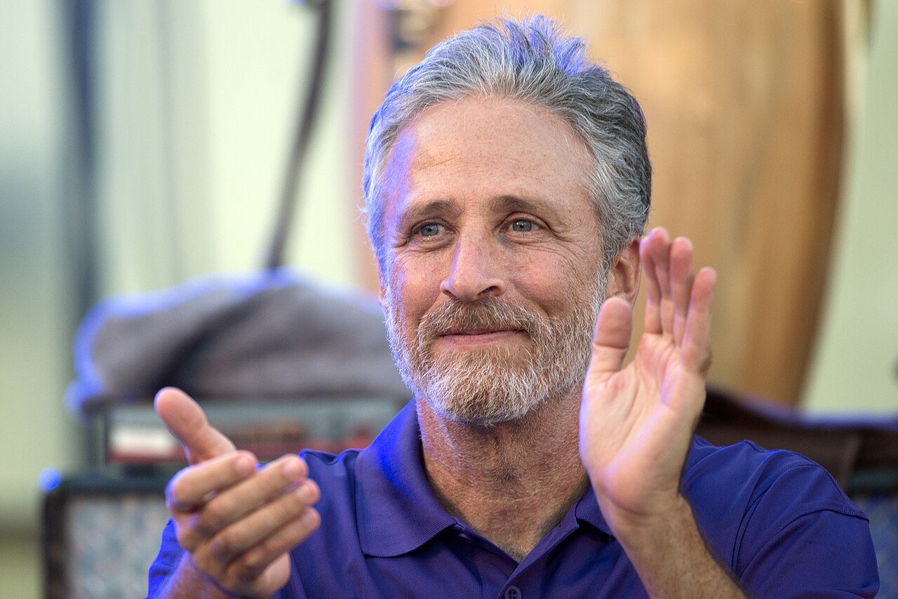 Jon Stewart applauding at the 2016 Department of Defense Warrior Games