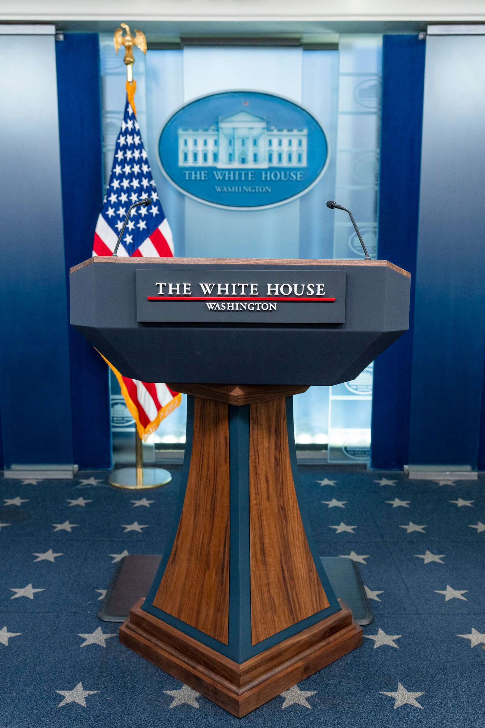 The lectern and seats inside the White House press briefing room in 2023